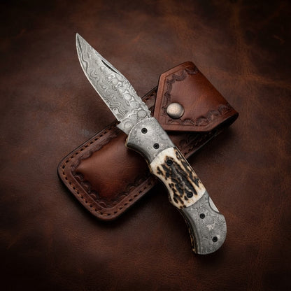 Handcrafted Custom Damascus Folding Knife – Raindrop Pattern Blade & Antler Bone Handle EDC