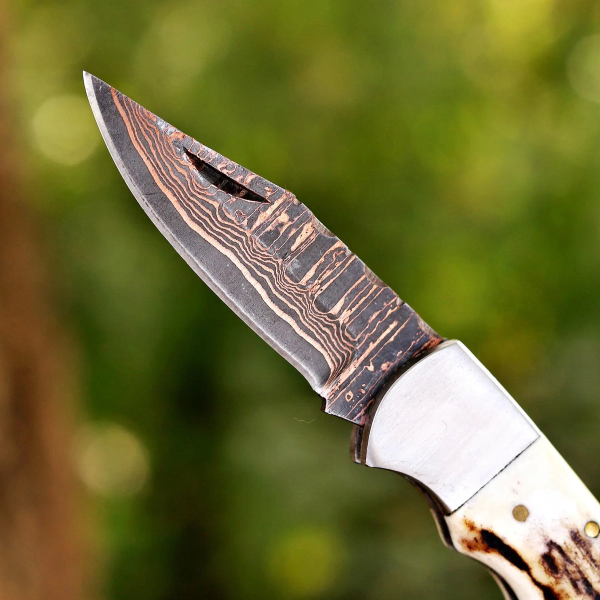 Premium Folding Hunting Knife – Copper Damascus Blade with Antler Handle