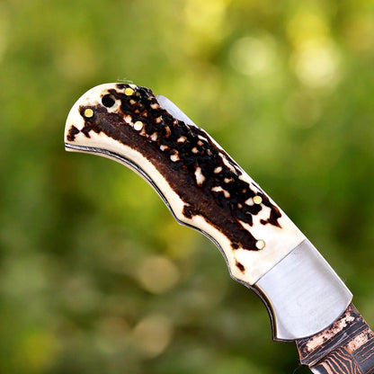 Premium Folding Hunting Knife – Copper Damascus Blade with Antler Handle