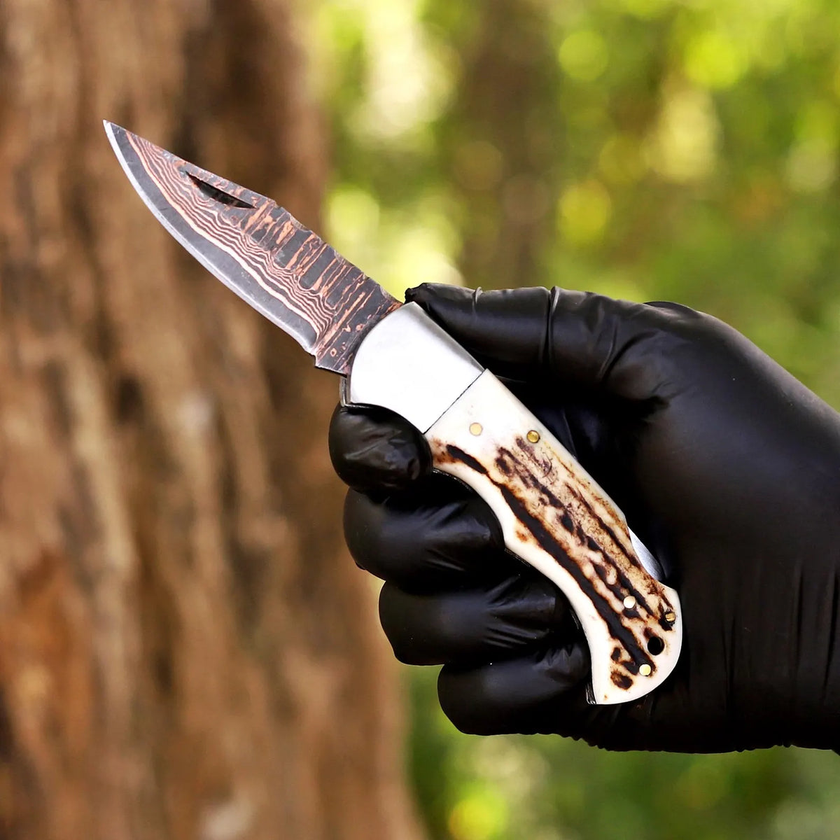 Premium Folding Hunting Knife – Copper Damascus Blade with Antler Handle