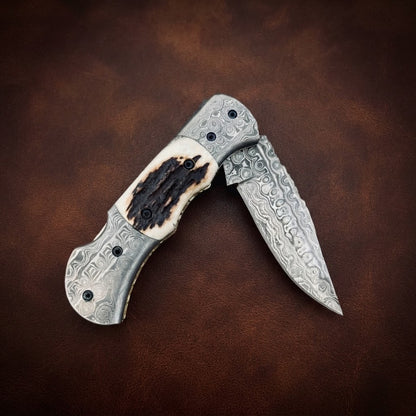 Handcrafted Custom Damascus Folding Knife – Raindrop Pattern Blade & Antler Bone Handle EDC